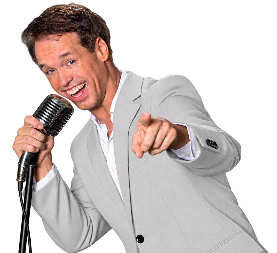 Dave van de Dam in een grijs pak