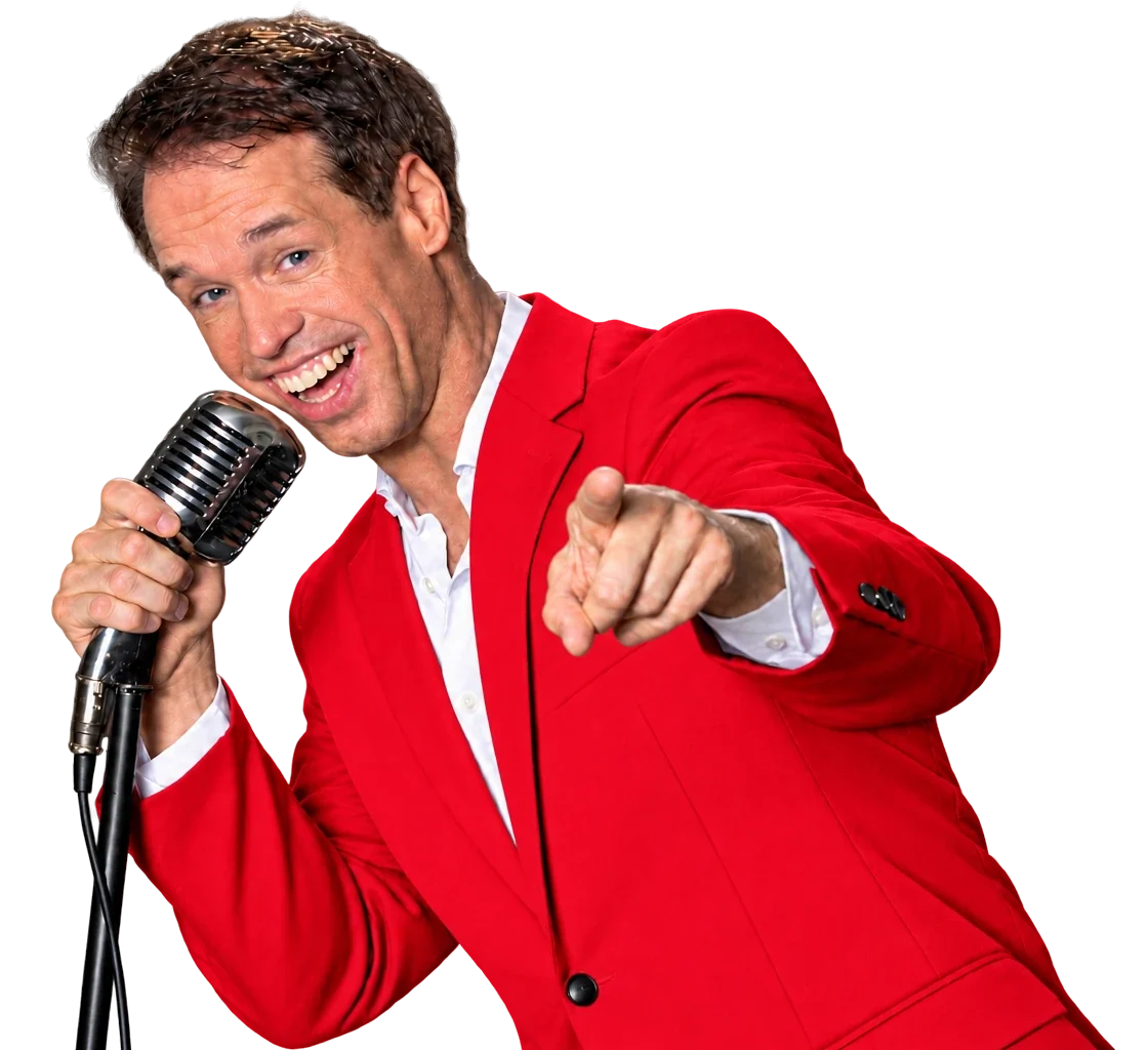 Dave van de Dam in een rood pak